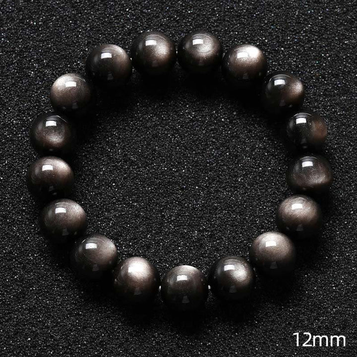 Braccialetto di protezione lenitiva in ossidiana lucida d'argento naturale Buddha Stones