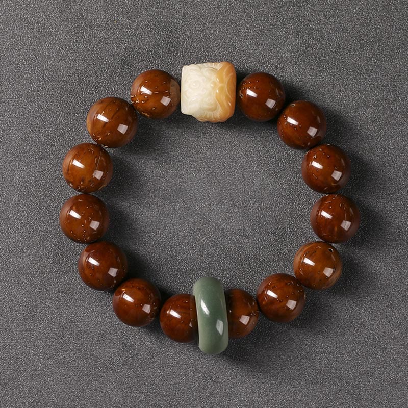 Braccialetto della saggezza del leone danzante dei semi di Bodhi viola Buddha Stones