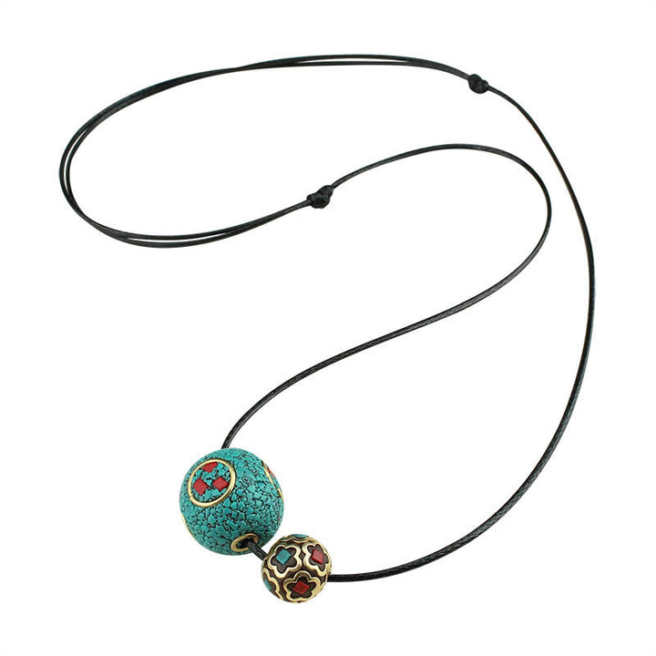 Collana con ciondolo con doppia perla turchese tibetana Buddha Stones, protezione e forza
