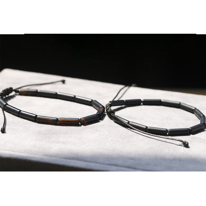 Braccialetto di protezione e supporto con perline di onice nero Buddha Stones