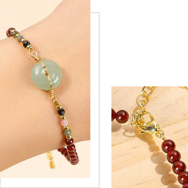 Braccialetto di perline con fibbia della pace in granato naturale Buddha Stones