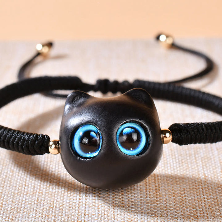 Bracciale intrecciato con motivo a testa di gatto in legno di ebano Buddha Stones, nodo di King Kong della pace - image 16