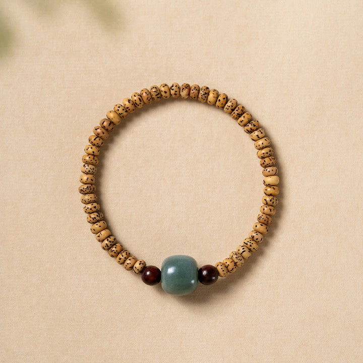 Braccialetto della saggezza Buddha Stones Bodhi Seed con piccola foglia di sandalo rosso