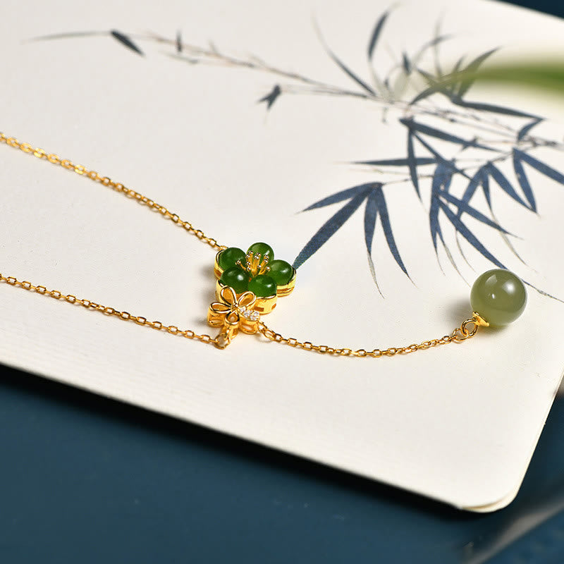 Collana con ciondolo portafortuna in argento sterling 925 con fiore di prugna in giada ciano Hetian, motivo Buddha Stones