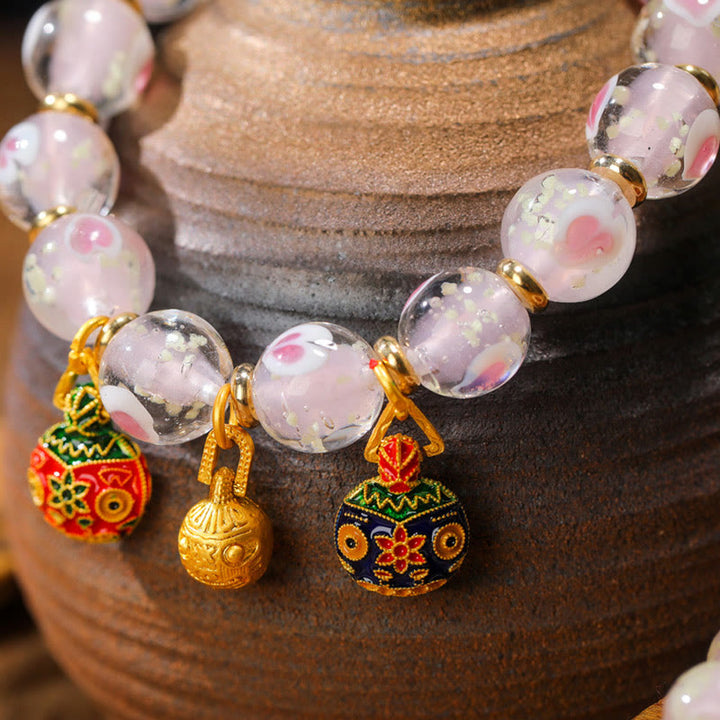 Buddha Stones Oro Deglutizione Bestia Famiglia Ciondolo Luminoso Rosa Cuore Amore Fluorescente Liuli Perline di Vetro Braccialetto Benedizioni