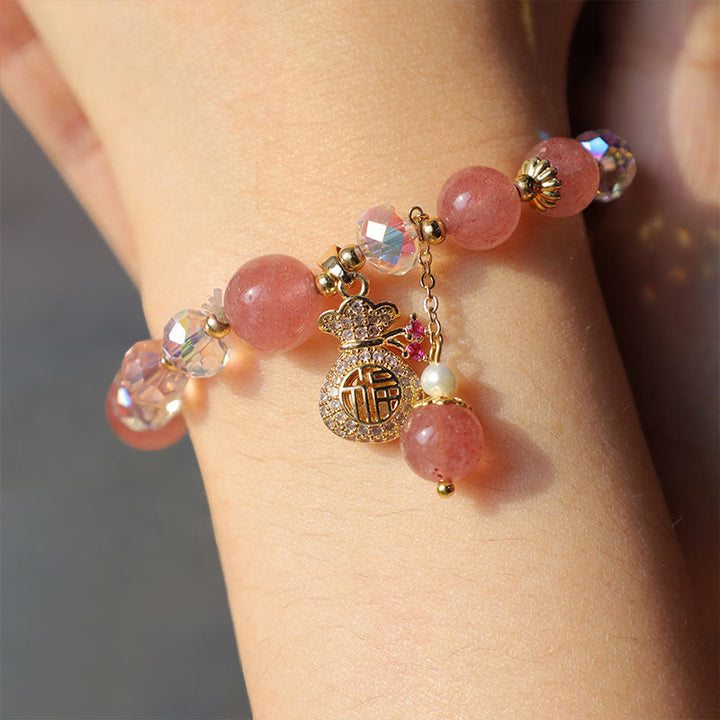 Braccialetto positivo con ciondolo a forma di sacchetto di denaro in cristallo di quarzo fragola naturale Buddha Stones