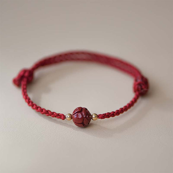 Braccialetto intrecciato con corda rossa calma, giada, cinabro e loto Buddha Stones