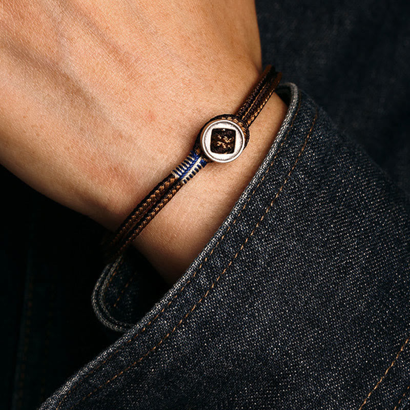 Braccialetto con cordino intrecciato di protezione con bottone fatto a mano in argento sterling 925 Buddha Stones