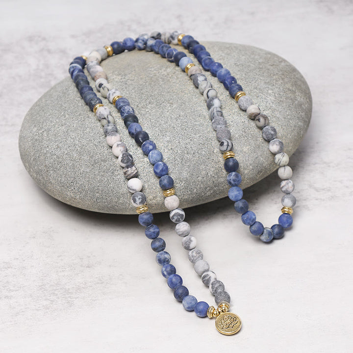 Buddha Stones 108 Braccialetto con ciondolo di loto in perline di Mala in diaspro Picasso naturale e pietra blu