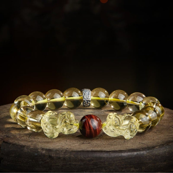 Braccialetto di protezione della prosperità con occhio di tigre PiXiu e citrino naturale Buddha Stones