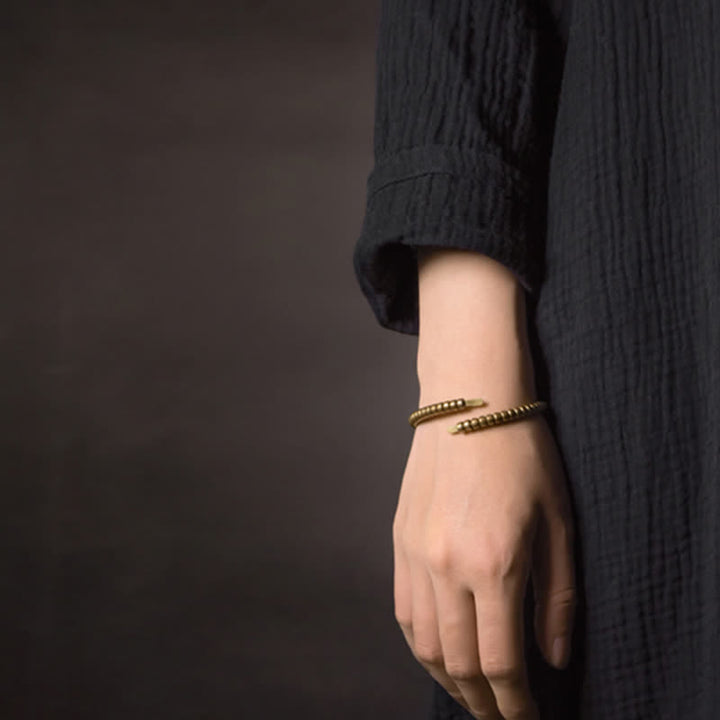 Bracciale regolabile con polsino in rame con design vintage Buddha Stones