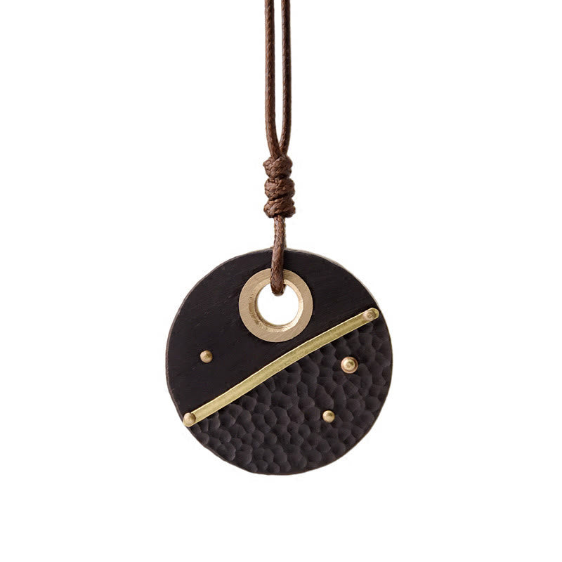 Collana con ciondolo in legno di ebano e rame, realizzata a mano , Buddha Stones, simbolo della pace