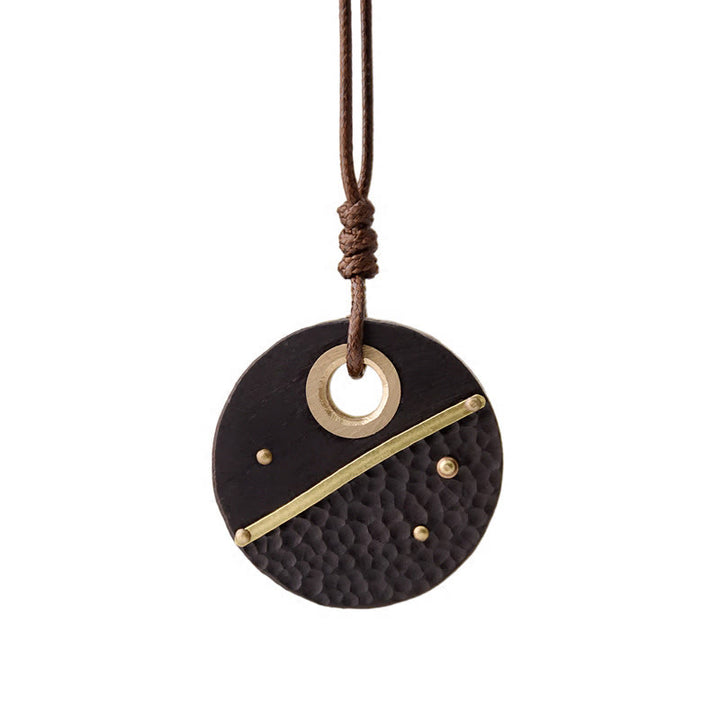 Collana con ciondolo in legno di ebano e rame, realizzata a mano , Buddha Stones, simbolo della pace