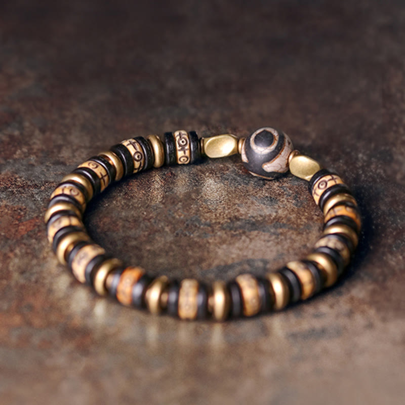Braccialetto di forza in perline di osso tibetano e legno di ebano con Buddha Stones
