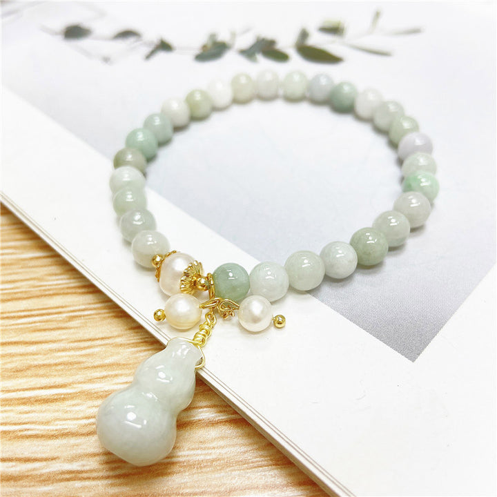 Braccialetto con ciondolo di protezione e benedizione in giada Buddha Stones