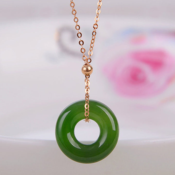 Collana con ciondolo in oro 14K con giada ciano rotonda e guarigione