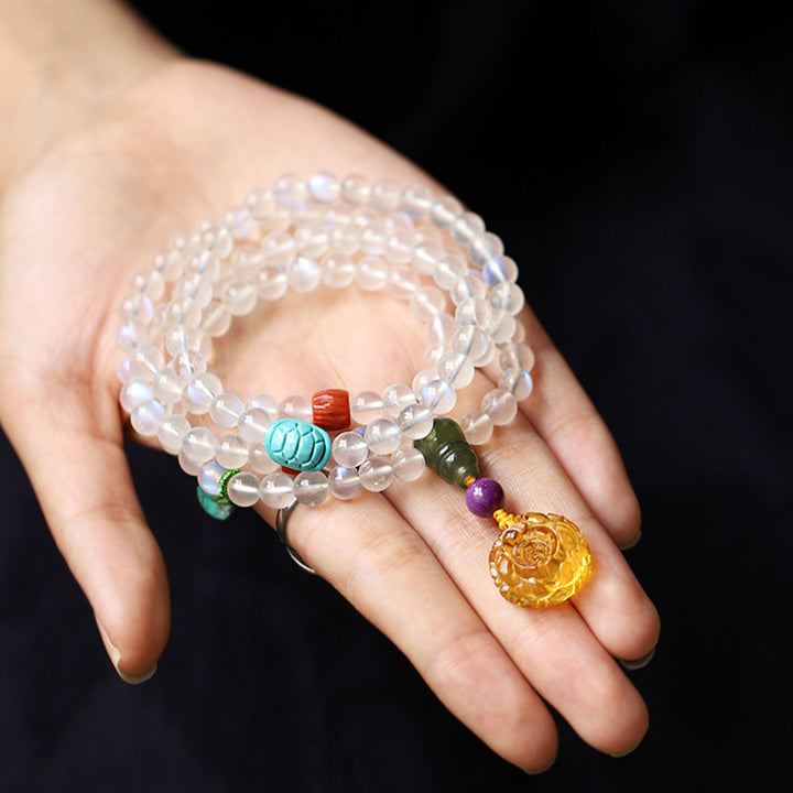 Braccialetto Mala con 108 perle di Buddha Stones , ambra, loto e turchese, per la guarigione con cristalli. - image 4
