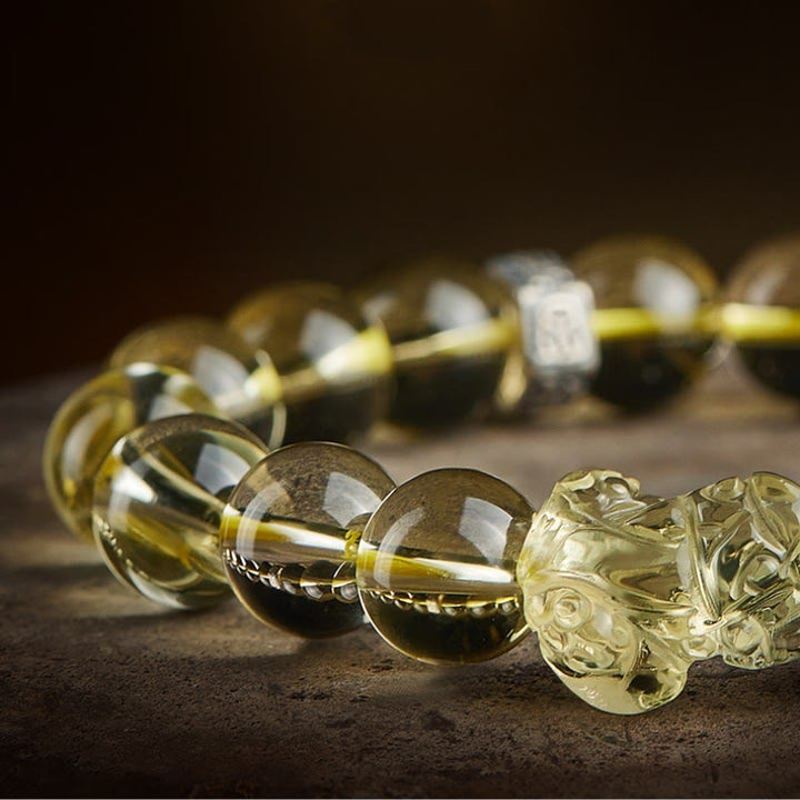 Braccialetto di protezione della prosperità con occhio di tigre PiXiu e citrino naturale Buddha Stones