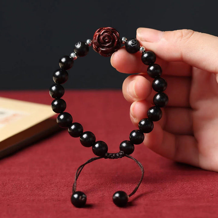 Braccialetto Buddha Stones con piccola foglia di sandalo rosso e lenitivo