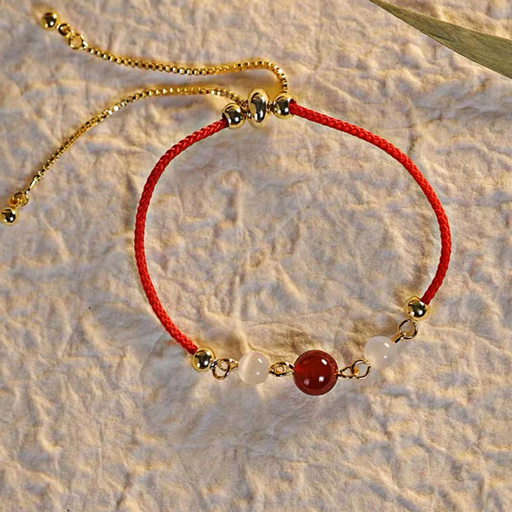 Braccialetto di fiducia in corda intrecciata con occhio di gatto e agata rossa Buddha Stones - image 4