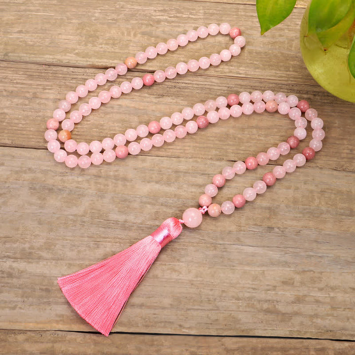 Braccialetto con nappa di cristallo rosa e 108 perle di Mala Buddha Stones