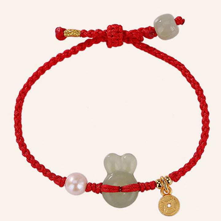 Braccialetto in corda rossa con moneta di rame e giada di Hetian dell'anno del coniglio in argento sterling 925