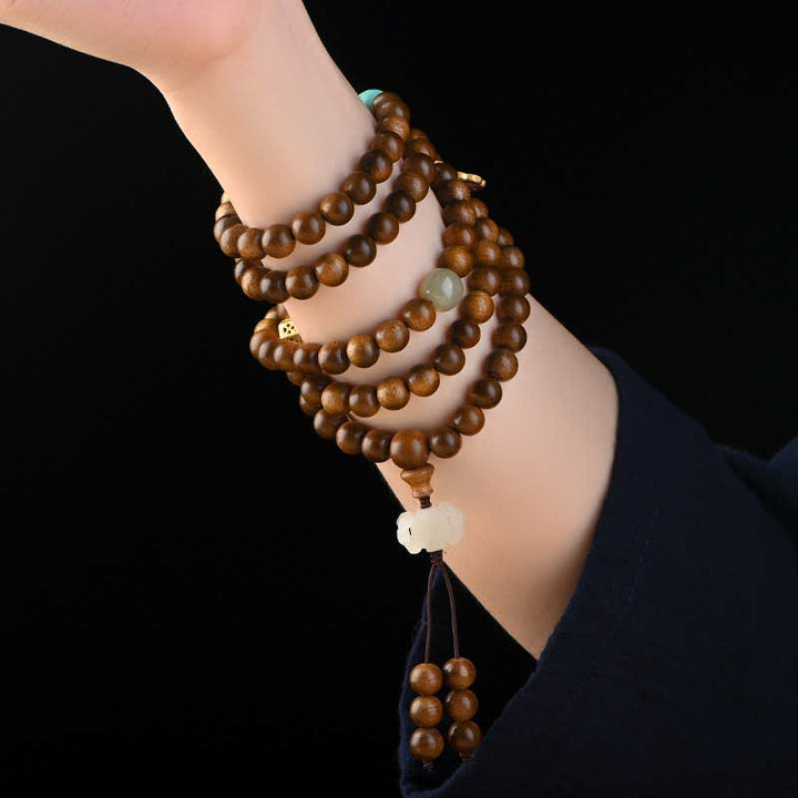 Braccialetto di protezione e calma in palissandro tibetano Buddha Stones Mala