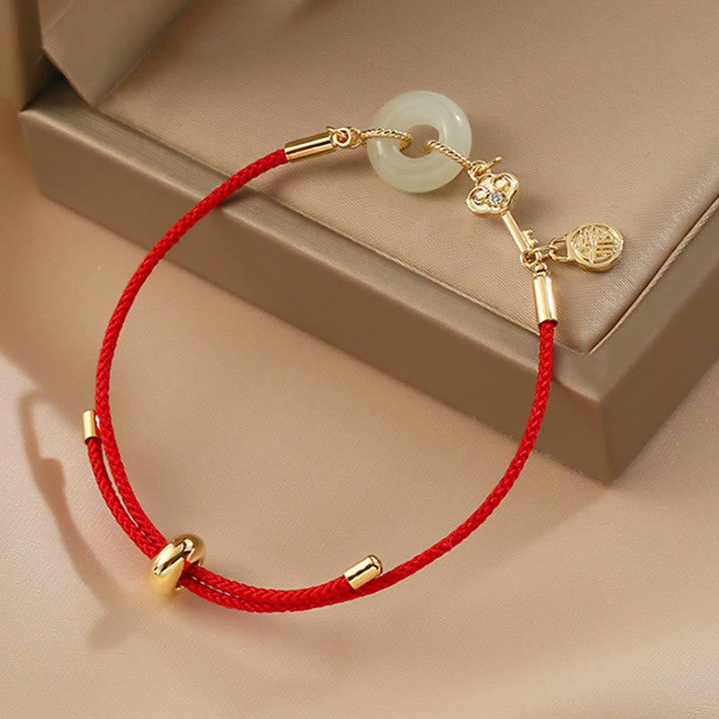 Braccialetto in corda rossa con fibbia della pace in giada Hetian placcato oro 18K con carattere Fu e Buddha Stones
