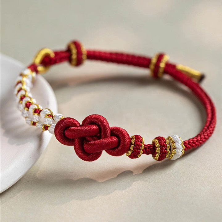 Braccialetto con corda portafortuna con ciondolo a forma di fiore di pesco con nodo d'amore fatto a mano Buddha Stones