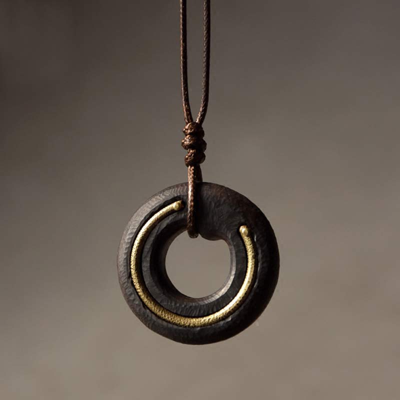 Collana con ciondolo in legno di ebano, cerchio zen, Buddha Stones , pace e calma - Legno di ebano - image 1