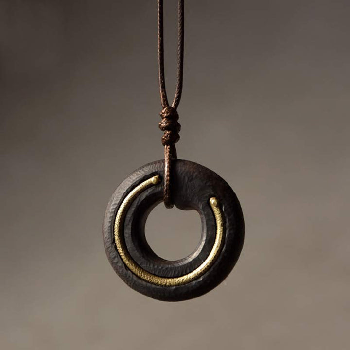 Collana con ciondolo in legno di ebano, cerchio zen, Buddha Stones , pace e calma - Legno di ebano - image 1