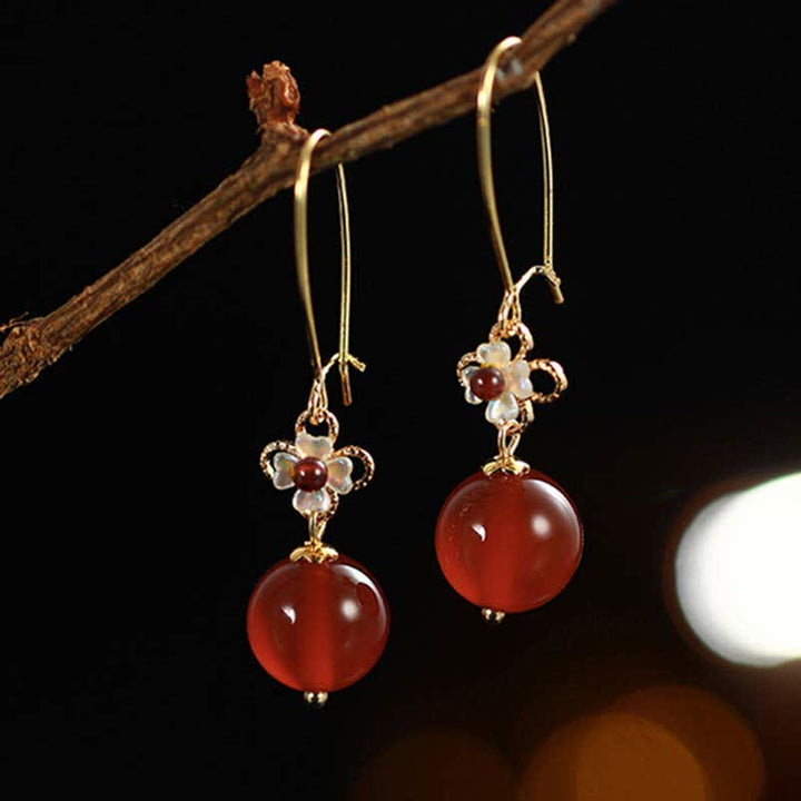 Orecchini Buddha Stones in argento sterling 925 con perline di fiori di agata rossa e fiducia