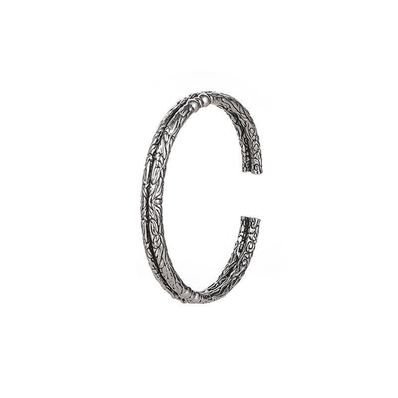 Bracciale rigido con polsino con motivo a drago inciso e bilanciamento