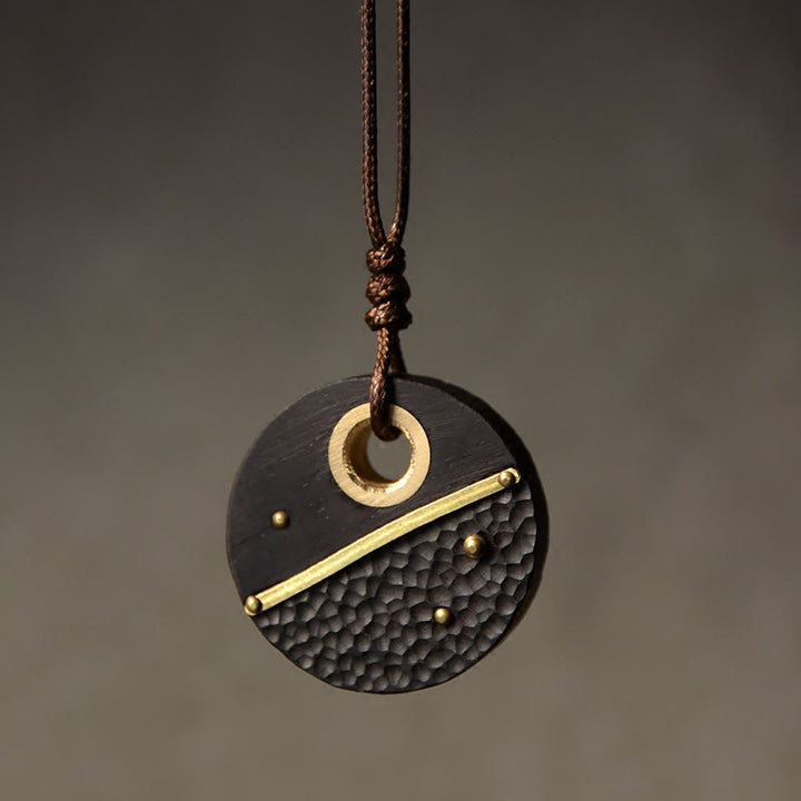 Collana con ciondolo in legno di ebano e rame, realizzata a mano , Buddha Stones, simbolo della pace