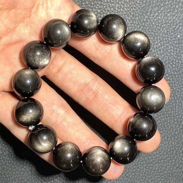 Braccialetto di protezione lenitiva in ossidiana lucida d'argento naturale Buddha Stones