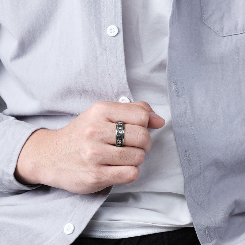 Anello girevole in acciaio al titanio con parole in equilibrio e calma