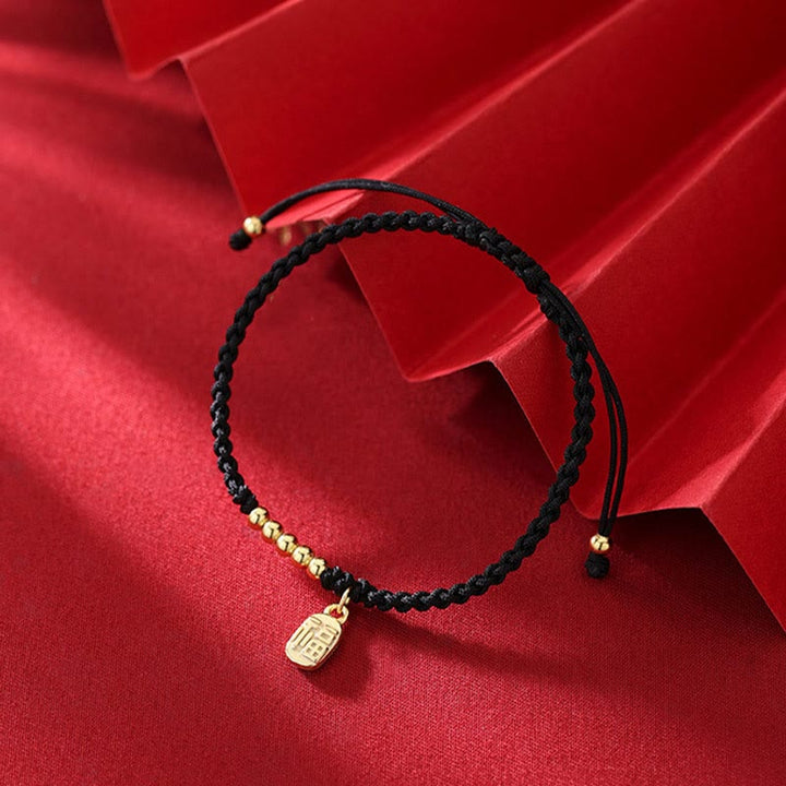 Braccialetto di corda con ciondolo a forma di carattere Fu fatto a mano con Buddha Stones