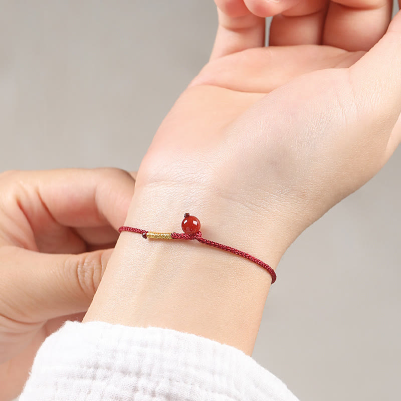 Braccialetto di corda rossa con benedizione in agata rossa naturale e cinabro Buddha Stones