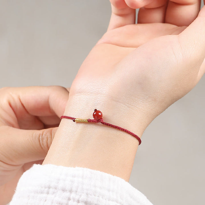 Braccialetto di corda rossa con benedizione in agata rossa naturale e cinabro Buddha Stones