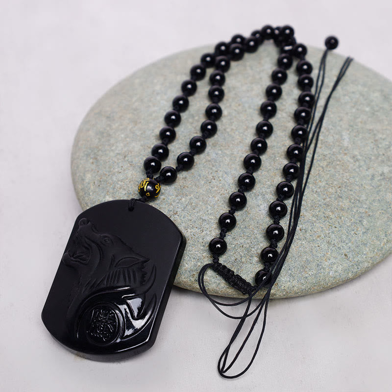 Collana con ciondolo di purificazione del lupo in pietra di ossidiana nera Buddha Stones