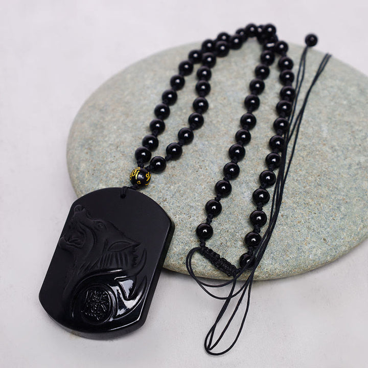 Collana con ciondolo di purificazione del lupo in pietra di ossidiana nera Buddha Stones