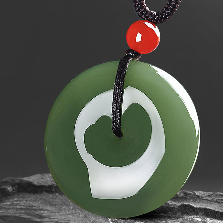 Collana con ciondolo a corda con fibbia della pace in giada rotonda naturale Buddha Stones