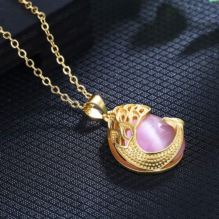 Collana pendente con ciondolo in cristallo rosa, calcedonio verde, pavone, rame, amore lenitivo