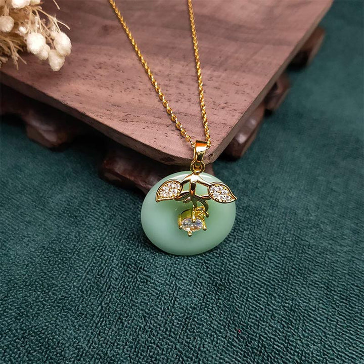 Collana con ciondolo a forma di foglia di giada rotonda con Buddha Stones e fortuna
