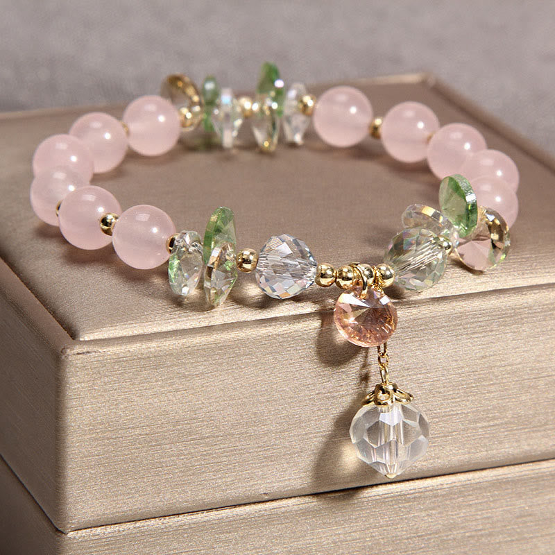Braccialetto con ciondolo di pace in cristallo rosa con occhio di gatto Buddha Stones