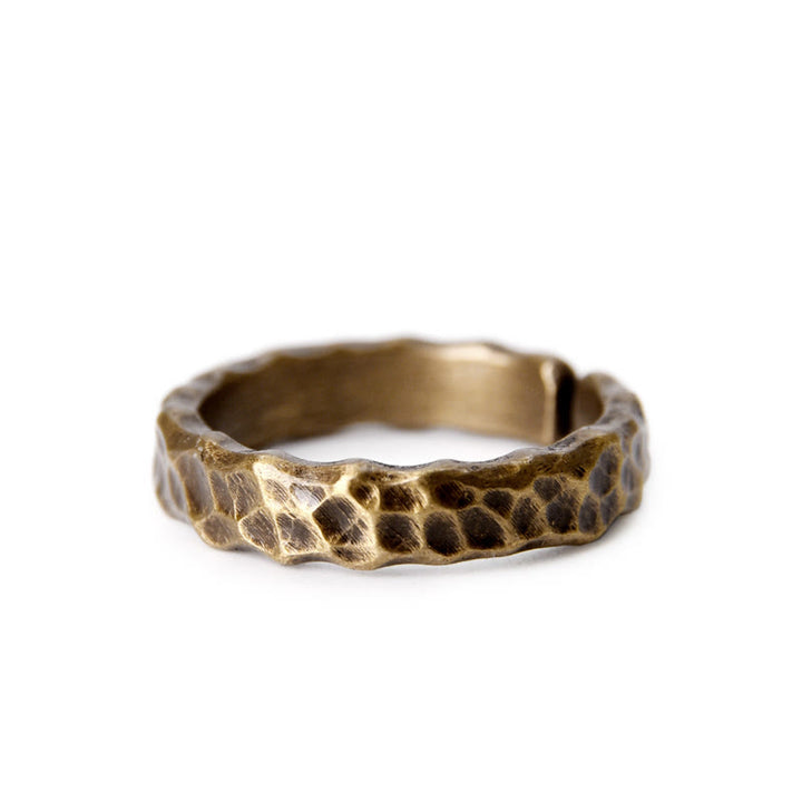 Anello portafortuna in ottone e rame con motivo a rilievo tibetano