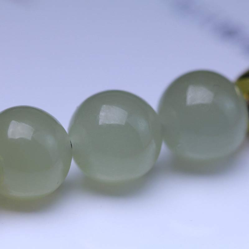 Braccialetto intrecciato con corda rossa in semi di loto di giada naturale Buddha Stones