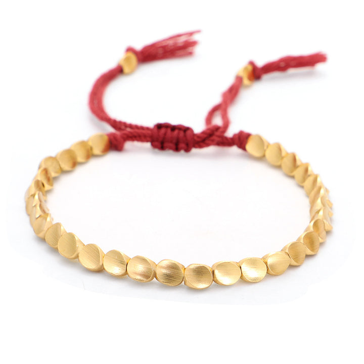Braccialetto portafortuna con perline di rame tibetano Buddha Stones