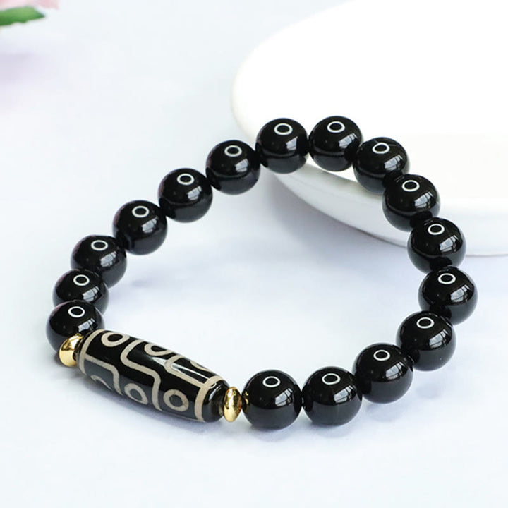 Braccialetto di potere in onice nero con perline Dzi tibetane a nove occhi Buddha Stones