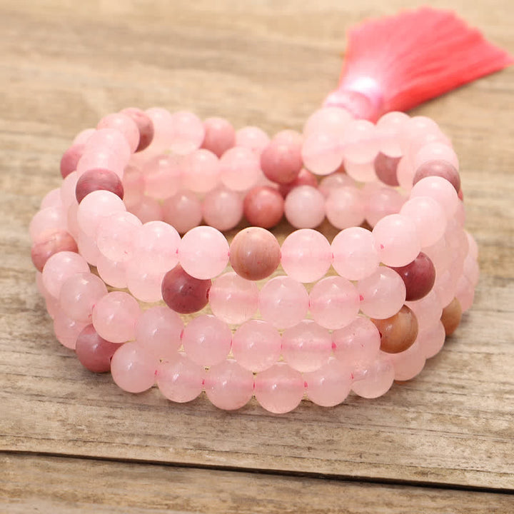 Braccialetto con nappa di cristallo rosa e 108 perle di Mala Buddha Stones